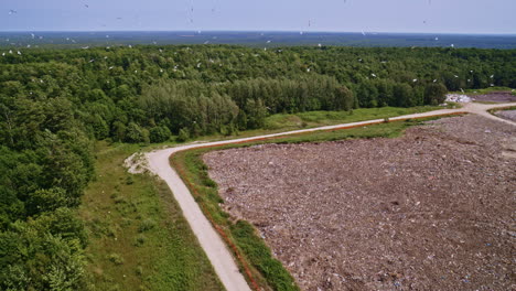 aerial view of a landfill surrounded by forest