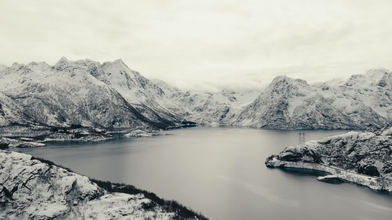 Monochrome Landscape Of Rugged Mountains Over Fjord Near Svolvaer, Norway. Aerial Drone Shot