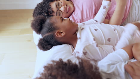 parents, children and holding hands in bed