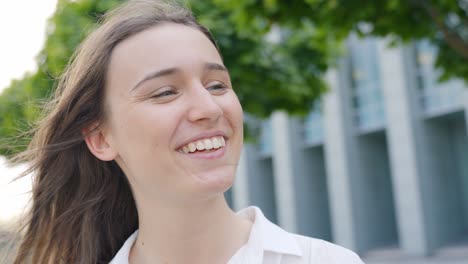 Close-up-profile-portrait-of-smiling-brown-haired-Caucasian-woman