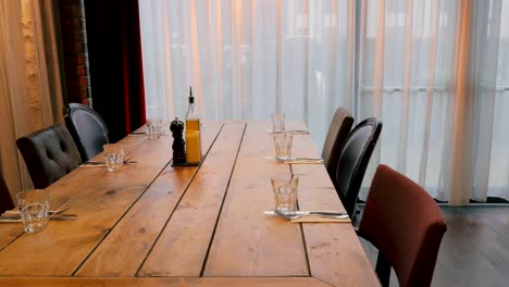 eclectic dining table with different chair types