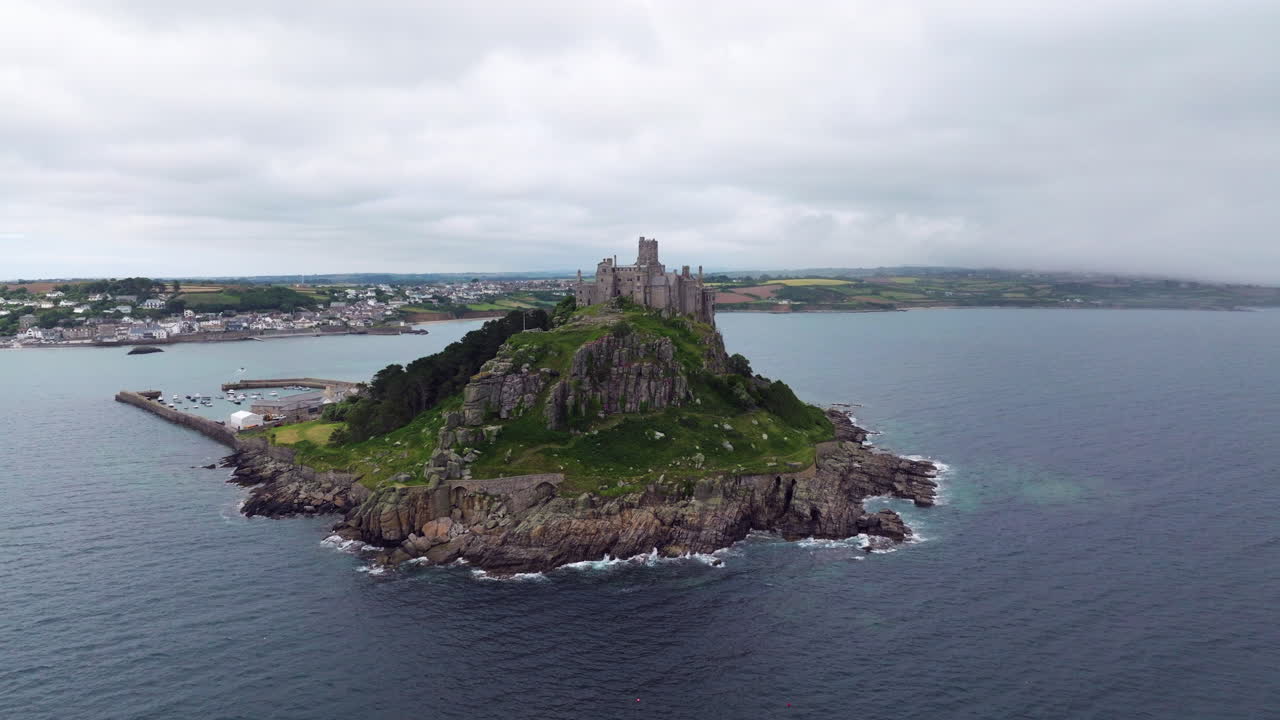Flying Towards The Saint Michael's Mount Castle, Tidal Island In Cornwall, England, UK. - aerial shot