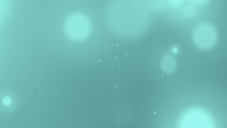 animation of light spots over green background