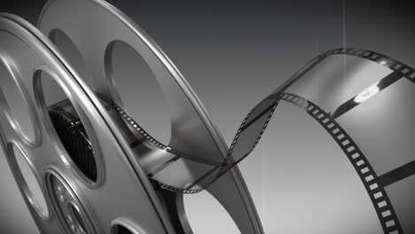 carrete de película contra un fondo en blanco y negro