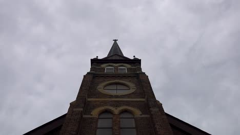 dark cloudy day timelapse of catholic church steeple