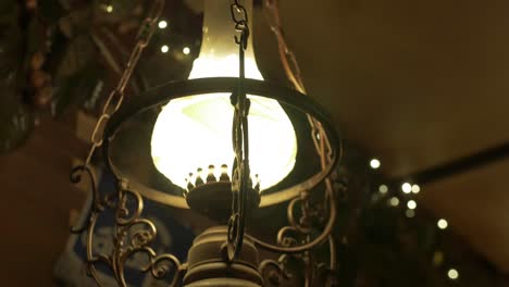 an old style lamp in a pub