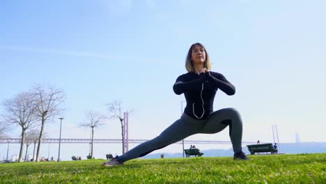sporty girl working out against blue sky