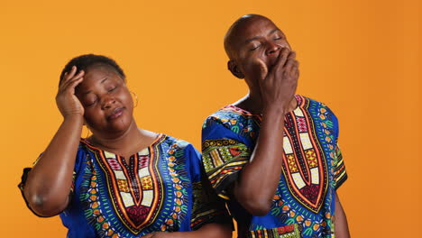 Sleepy-african-american-people-yawning-in-front-of-camera