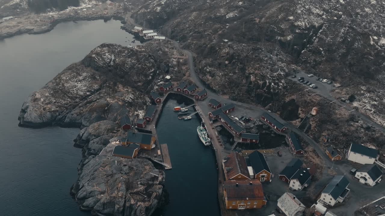 Harbor And Fishing Village Of Nusfjord Along Vestfjorden In Winter In Flakstadoya, Norway. - aerial shot