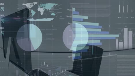 animation of financial data processing over office desk with computer