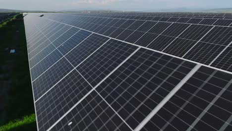 Rows-of-solar-panels-stretching-into-the-distance-on-a-clear-sunny-day