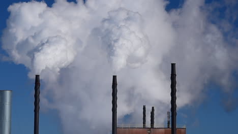 steam billowing out of exhaust towers