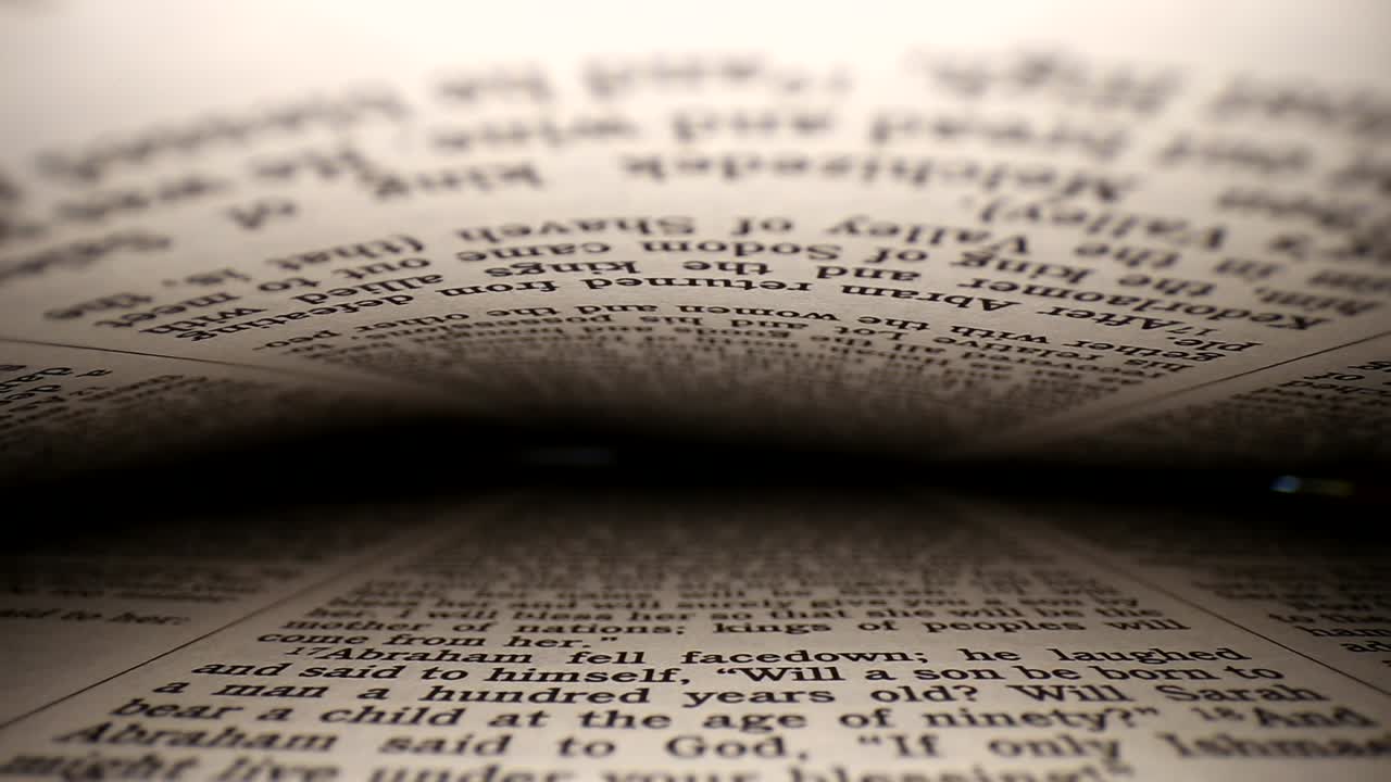 Pushing lens into a book center of page slowly