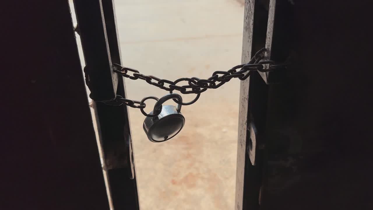 a gate is locked with the chain