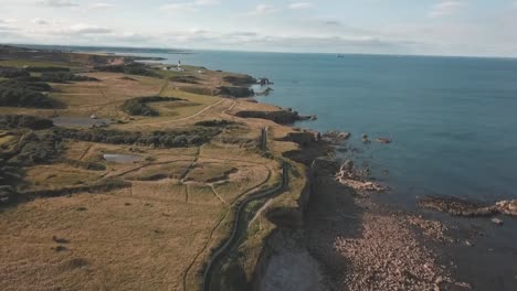 Aerial-footage-of-Whitburn-coastline-in-the-North-East-of-England-on-a-summers-day