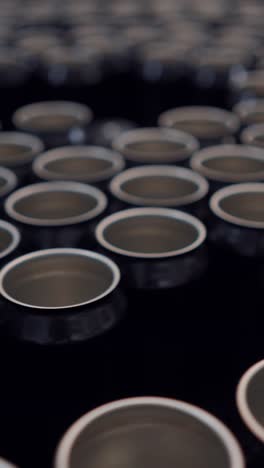 empty beverage cans on a production line