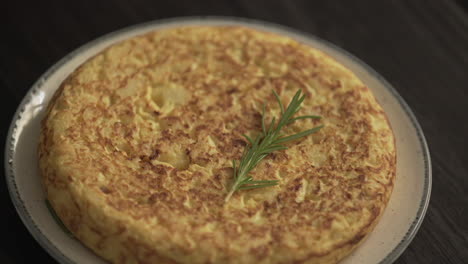 rotating spanish omelette, tortilla española. close up