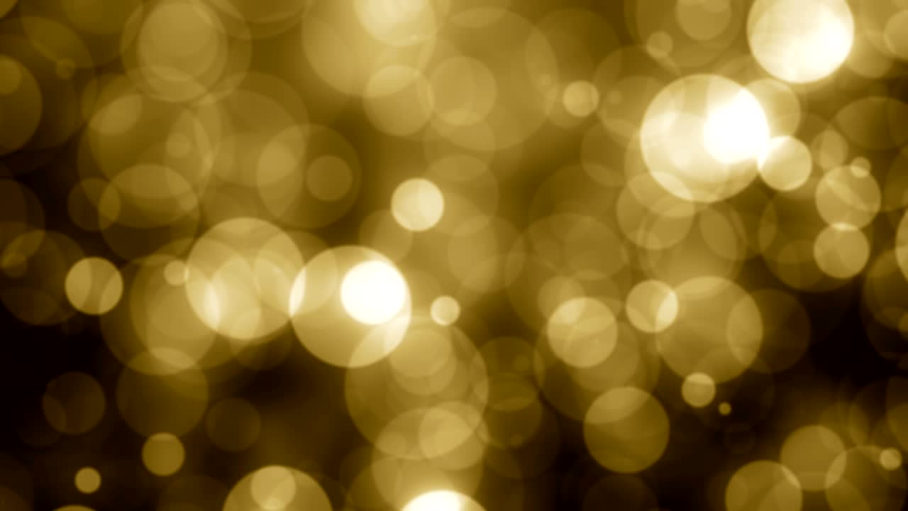 Partikler guldglimmer bokeh prisstøv abstrakt baggrundsloop