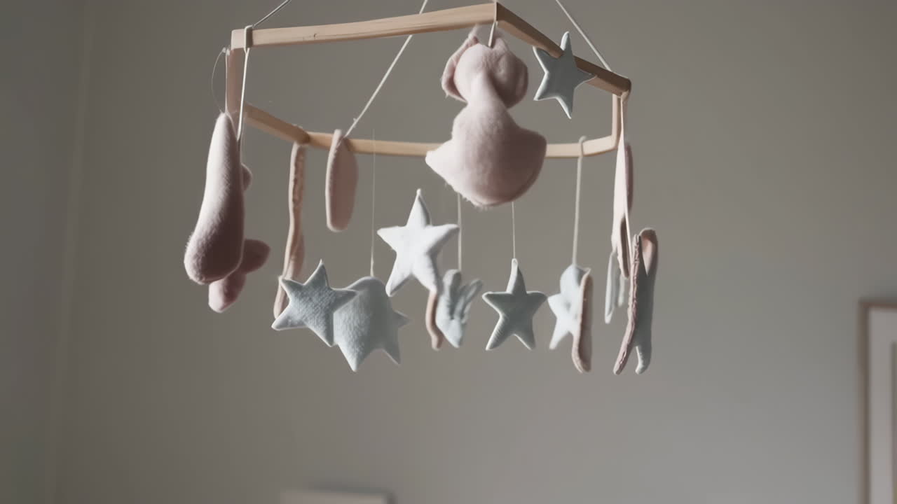 Modern Baby Nursery with Crib and Mobile