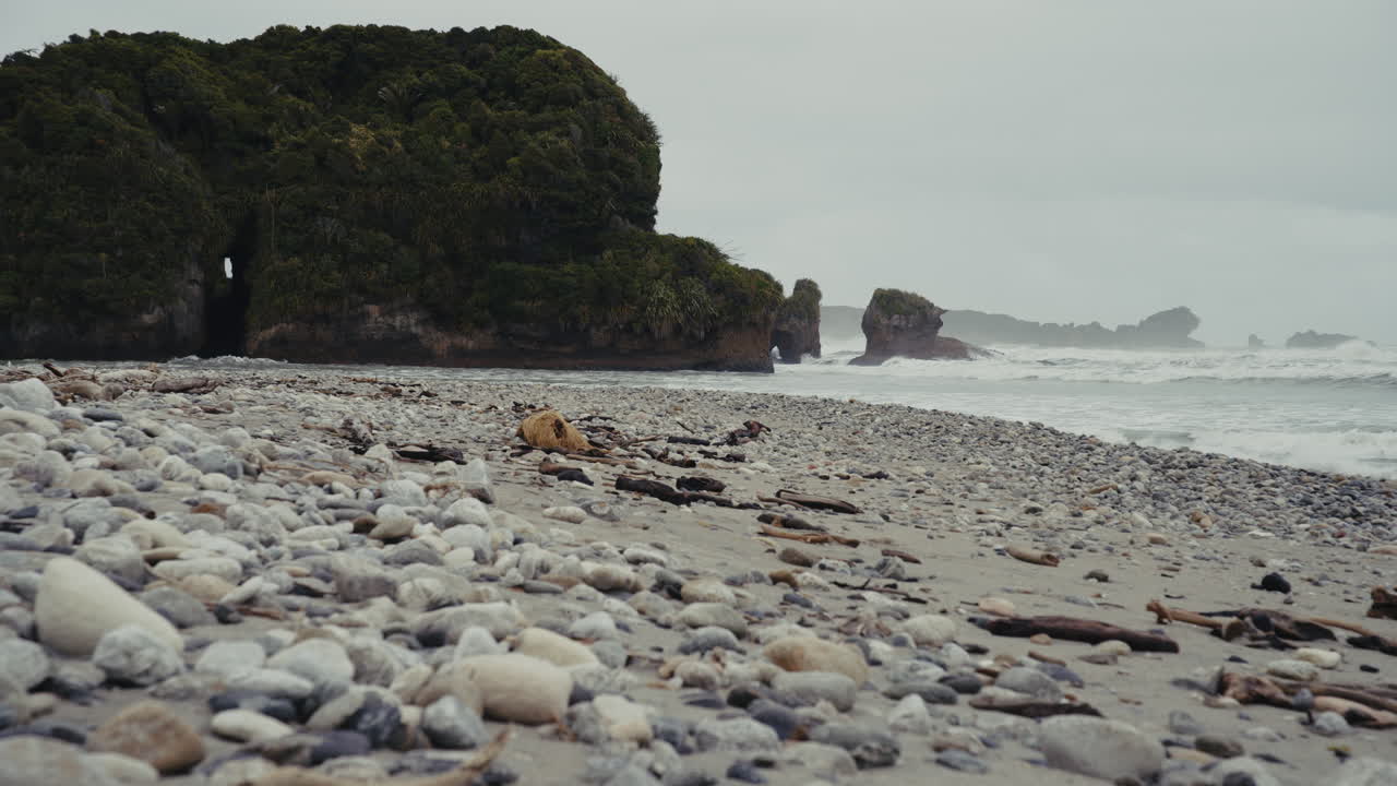 Rocky Beach Scene with Dramatic Waves