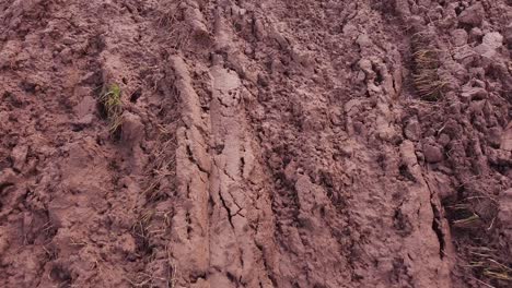 freshly plowed soil field for cereals from above aerial view