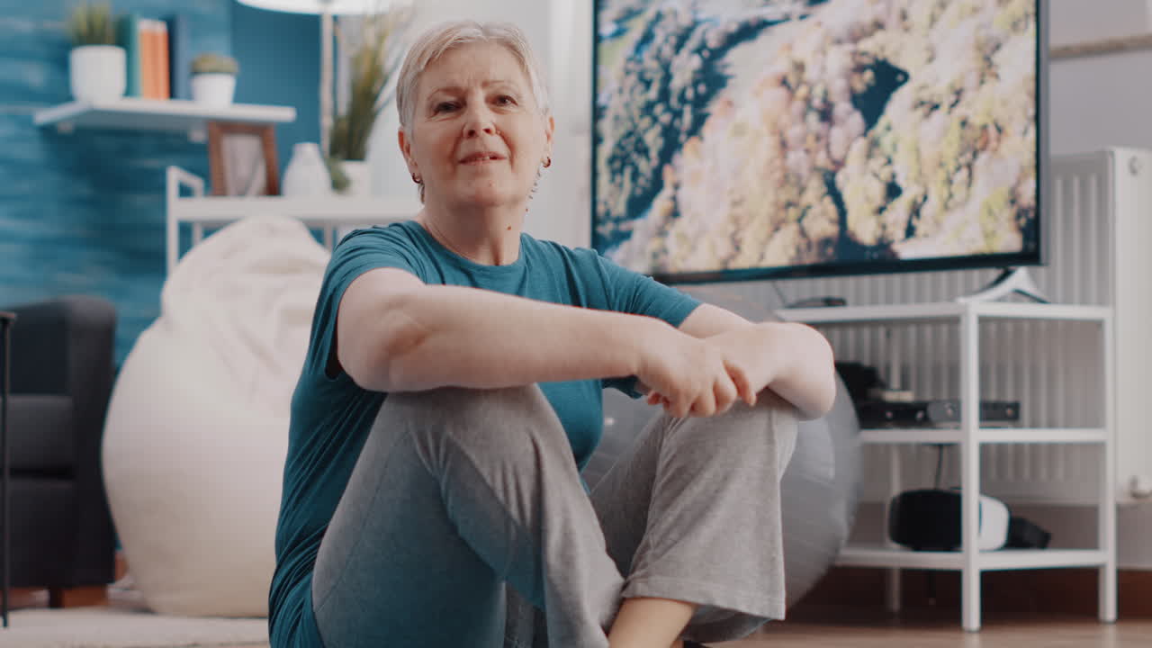 Portrait of senior woman preparing to do physical exercise
