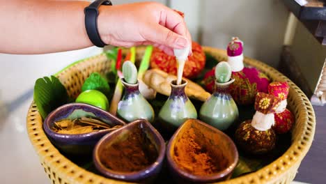 hand preparing spa ingredients in krabi, thailand