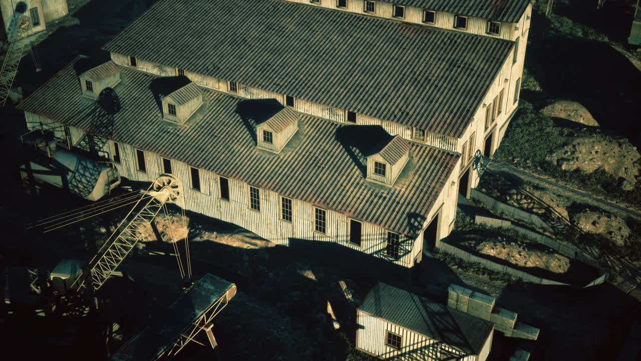 Historic warehouse stands resilient in the golden glow of sunset