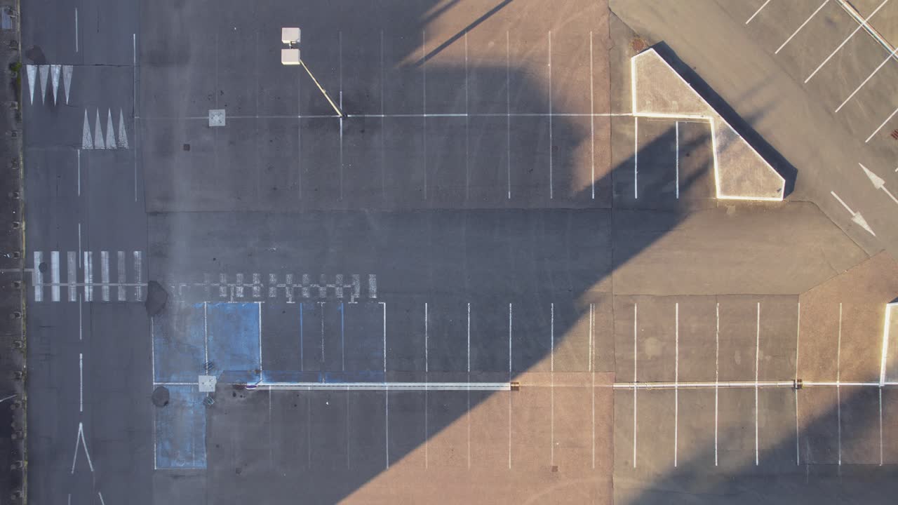 Top View Of Empty Parking Lot On A Sunny Day
