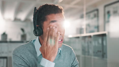 man wearing headset in office