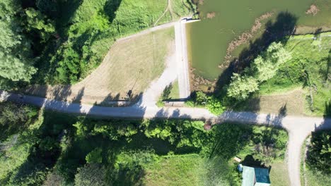 Descent-to-Bottom-of-Lake-Park-Grounds,-Rural-Ontario