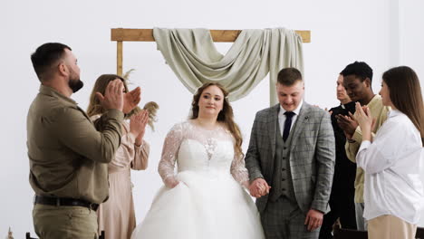 happy couple leaving the altar