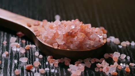 Himalayan-pink-salt-in-a-wooden-is-used-to-flavor-food.-Due-mainly-to-marketing-costs,-pink-Himalayan-salt-is-up-to-twenty-times-more-expensive-than-table-or-sea-salt.