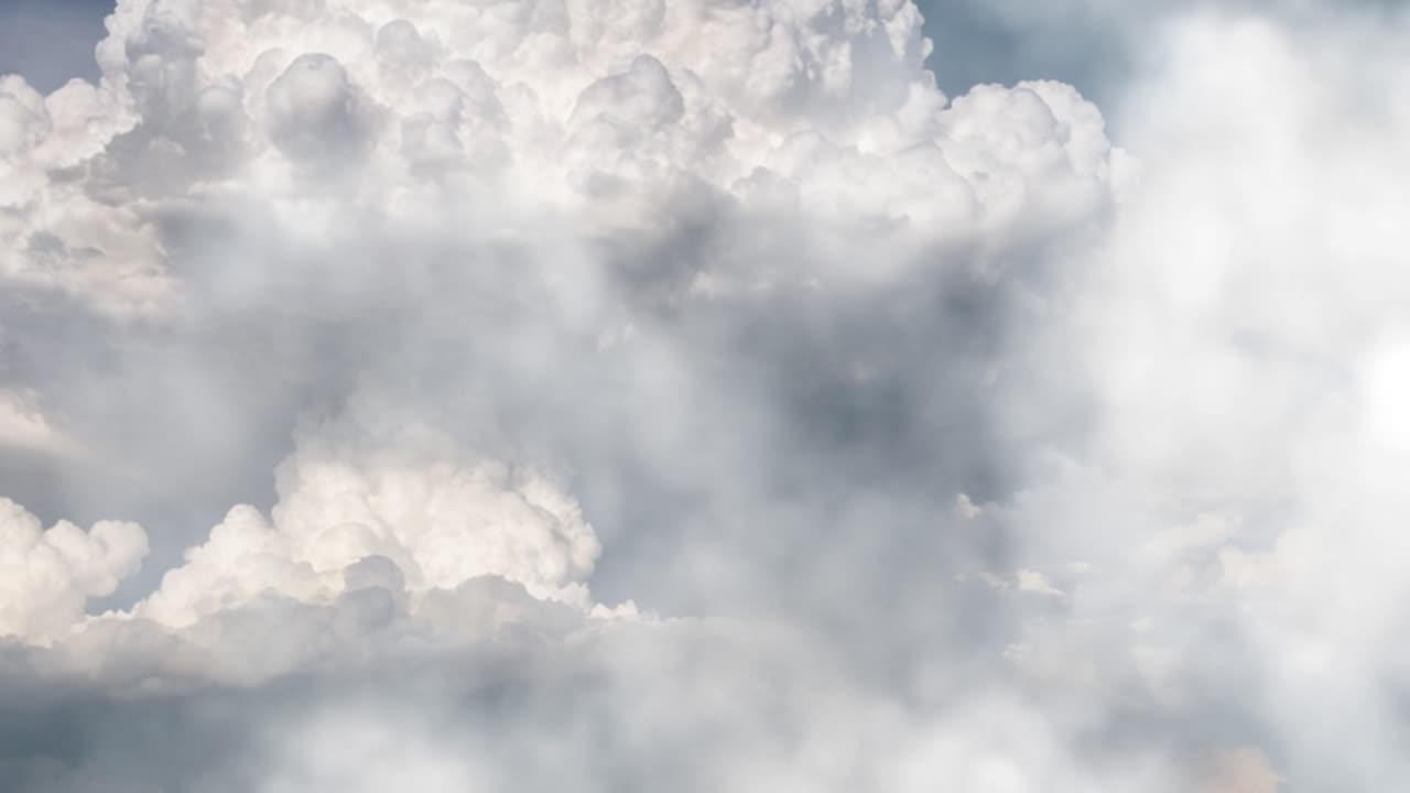 aerial view of towards the storm in white clouds