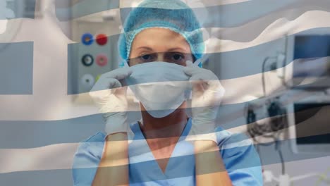 animation of flag of greece waving over female surgeon in operating theatre