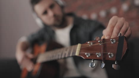 adjusting and calibrating guitar close up