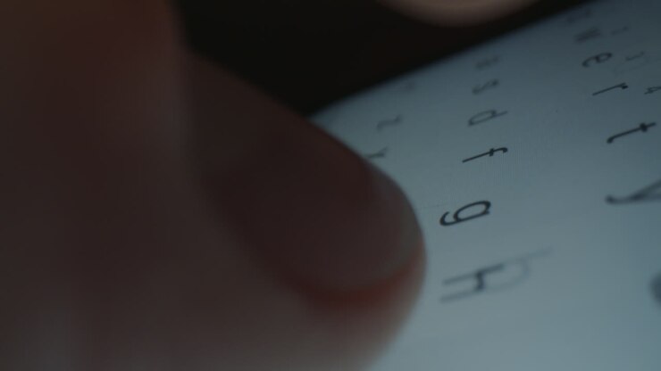 Person typing on a smartphone screen
