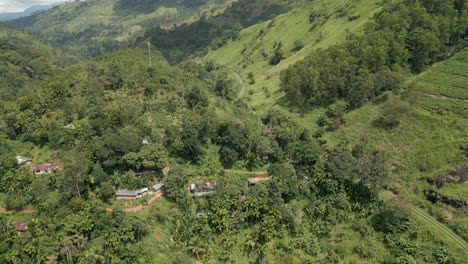 establishing aerial drone shot looking down vally in demodara towards hali-ela in sri lanka