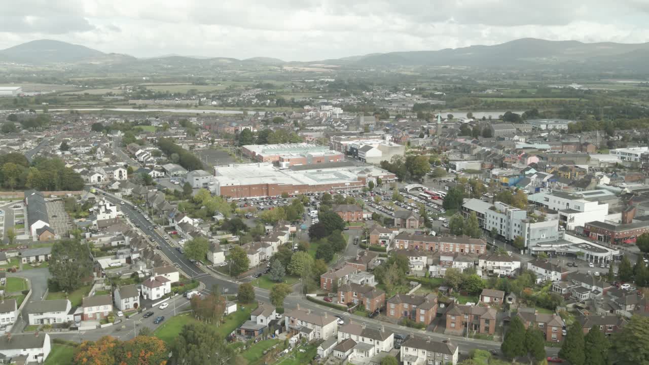 Dundalk, County Louth, Ireland - A Scenic View of the City With a Sweeping Backdrop of Towering Mountains - Aerial Drone Shot