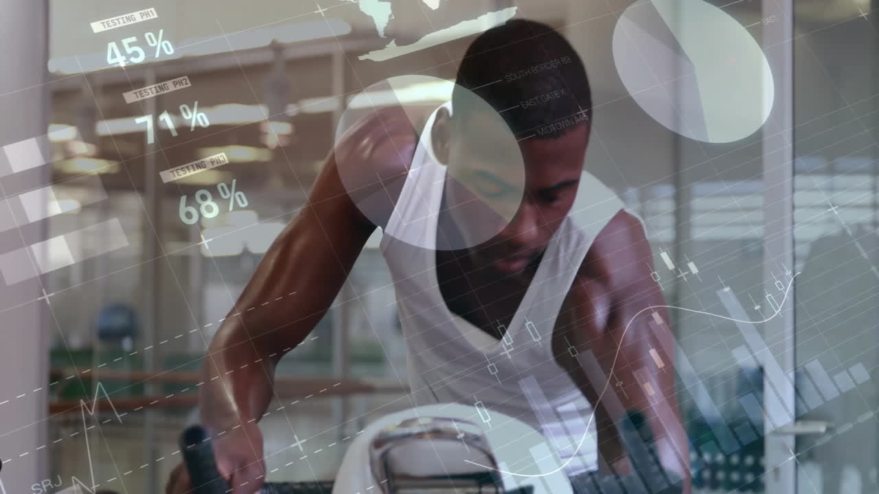 Fitness data animation over man exercising on stationary bike in gym