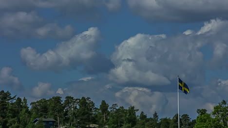 Time-lapse-shot-of-swedish-flag-waving-in