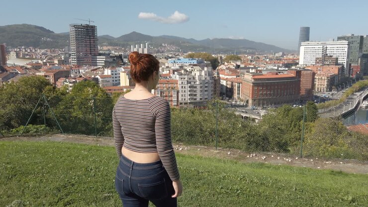 Woman overlooking a city view