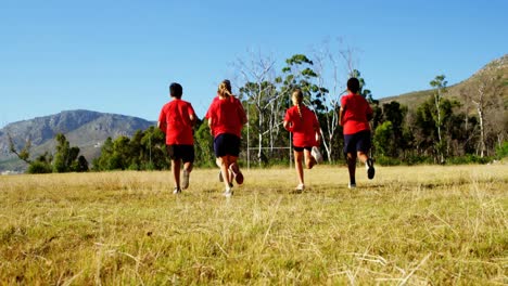 trainer training kids in the boot camp