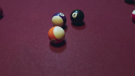 a pool break at the start of a game breaking the balls apart