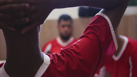 depressed soccer players in the locker room