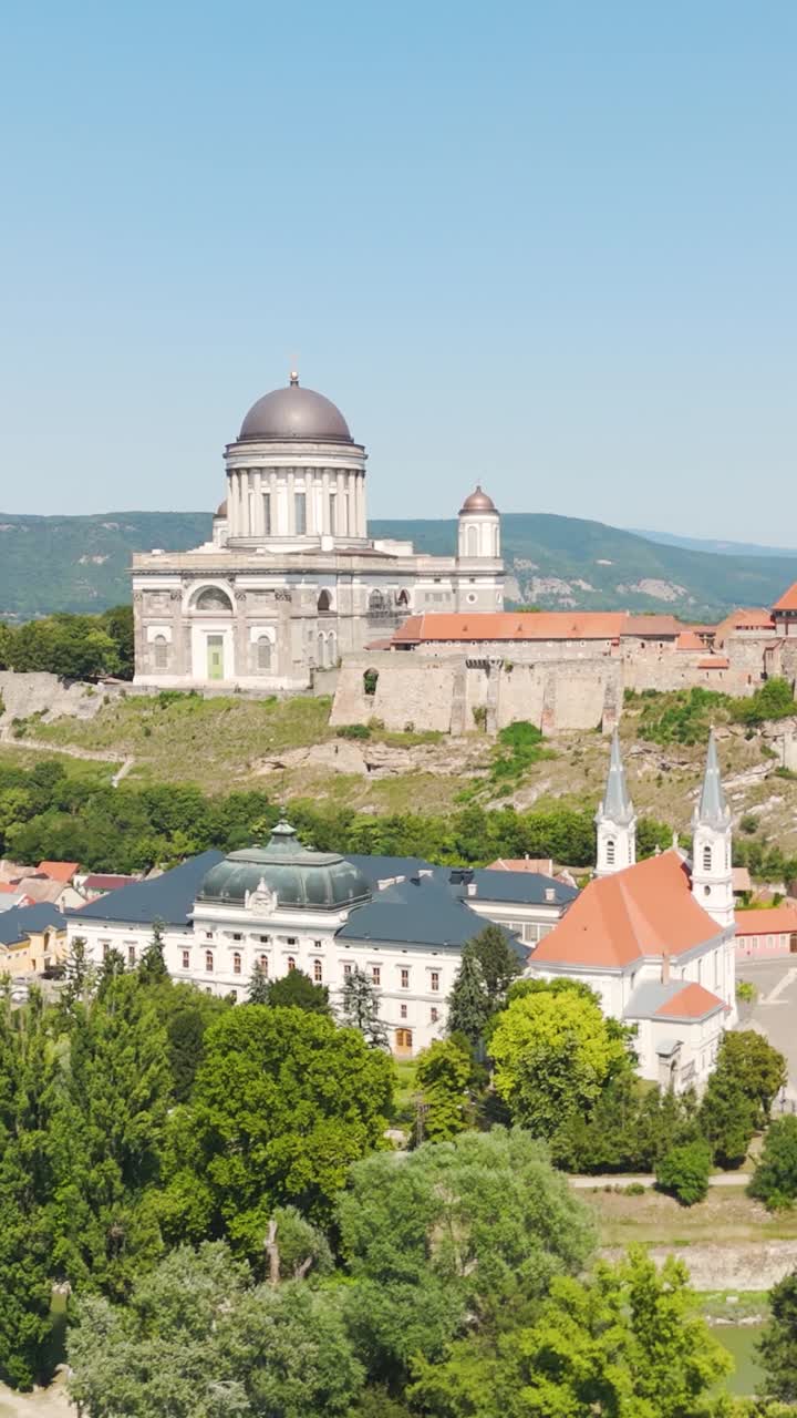 Stunning vertical aerial of Esztergom Basilica and Castle with panoramic views of the Danube River