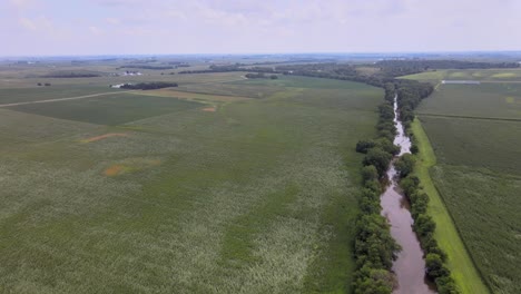 Aerial-Drone-Video-Of-Rich,-Green-Rural,-Agrarian-Agricultural-Farmland-Corn-And-Bean-Midwest-Heartland-Of-Iowa