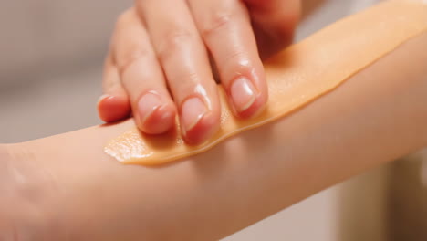 arm hair removal process with wax or sugaring paste