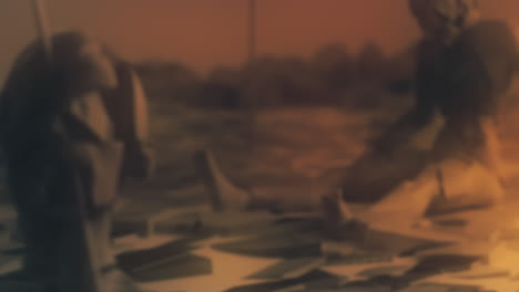 destroyed andorids on a junkyard in yellow light