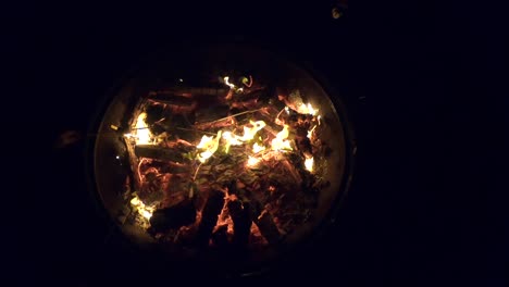 Slow motion video of bonfire at a children's camp night.